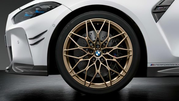 20-/21-дюймові ковані диски M Performance Cross-Spoke 1000 M у кольорі Frozen Gold Bronze.