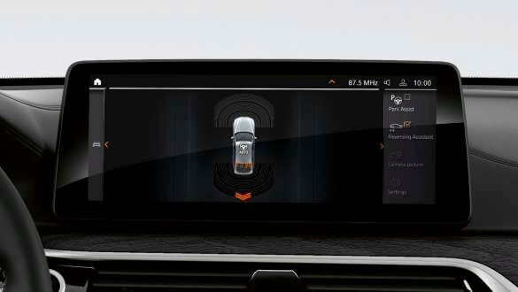 Асистент руху заднім ходом.